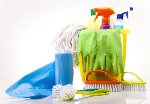 Safe carpet cleaning setup with equipment and protected flooring